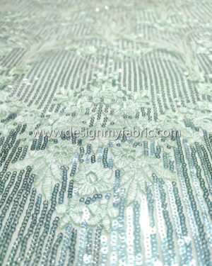 Light green lace fabric with feathers, sequins and  flowers #91439