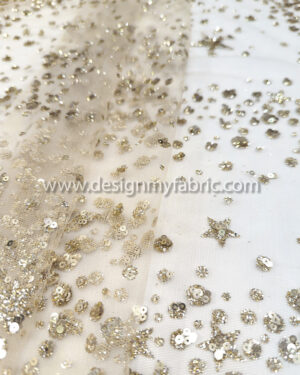Gold star glitter fabric #99577